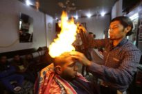 Hottest cut of all – Gaza barber wields blowtorch